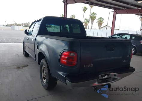 2001 Ford F150 Supercrew из США, поврежденный, VIN 1FTRW07W01KE24526